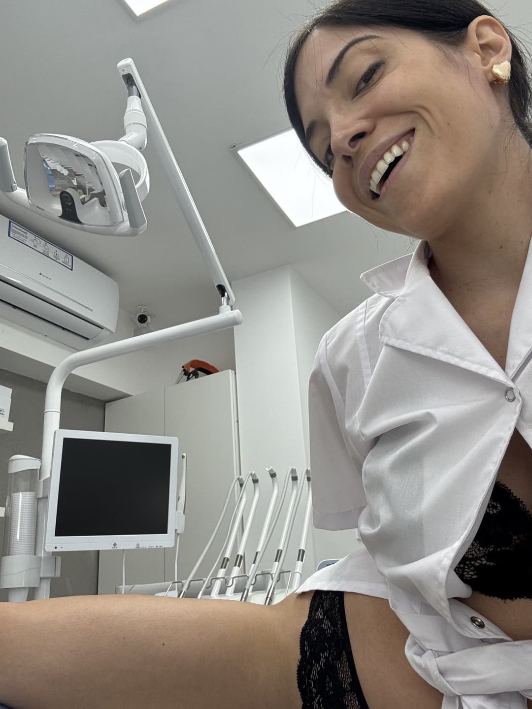 I like to caress myself and raise the temperature while my patients look at me.