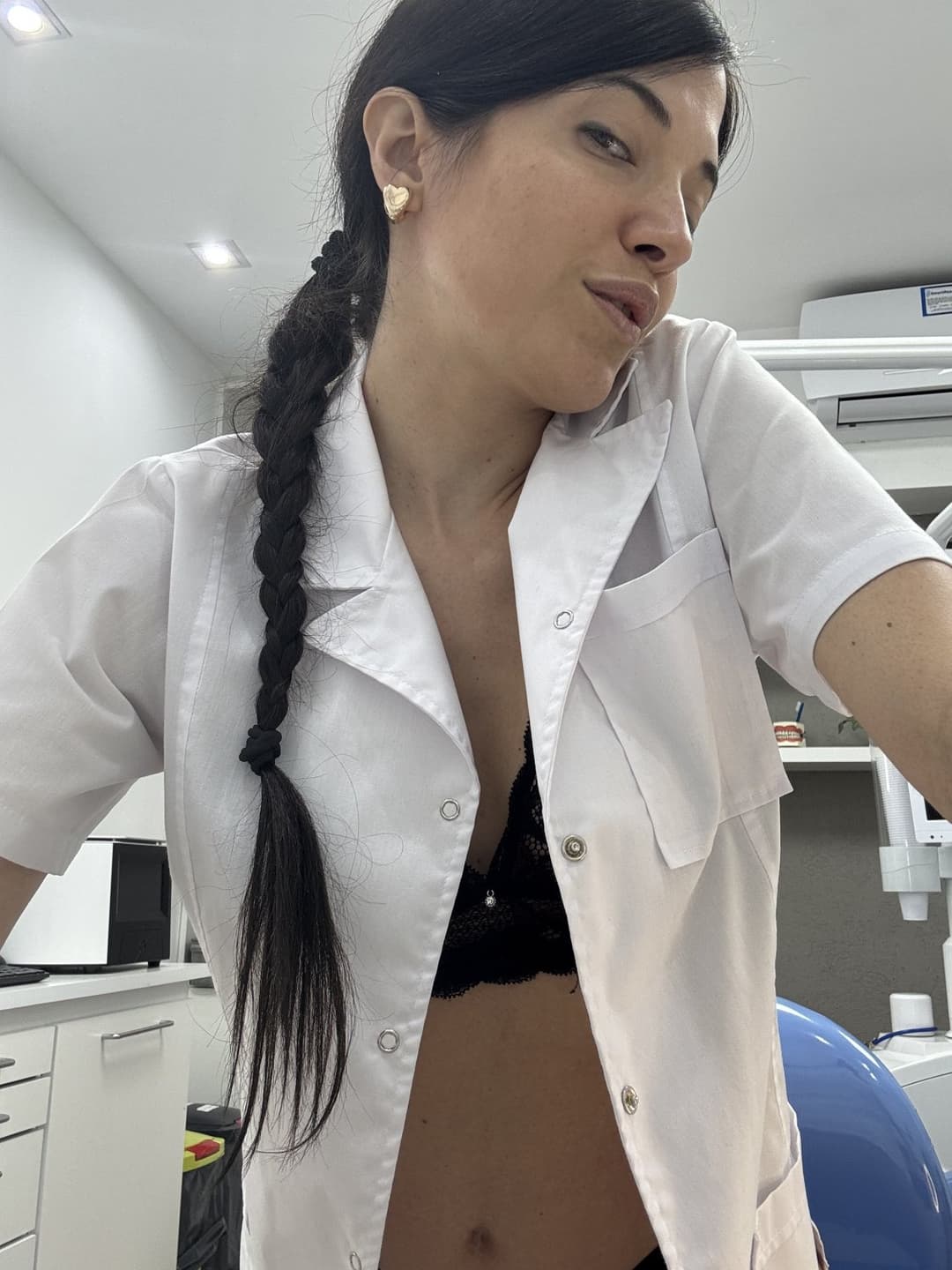 I like to caress myself and raise the temperature while my patients look at me.
